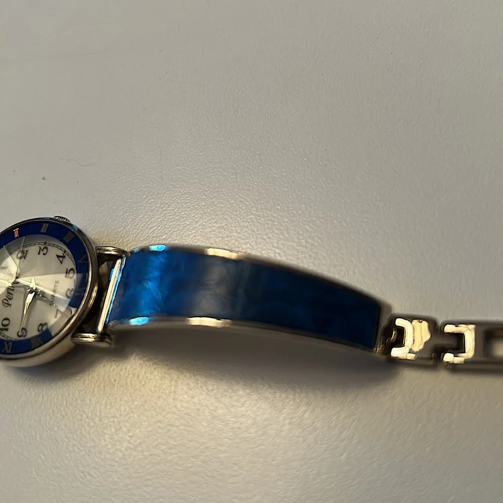 Two vintage quartz watches one stainless steel with hearts one with blue trim